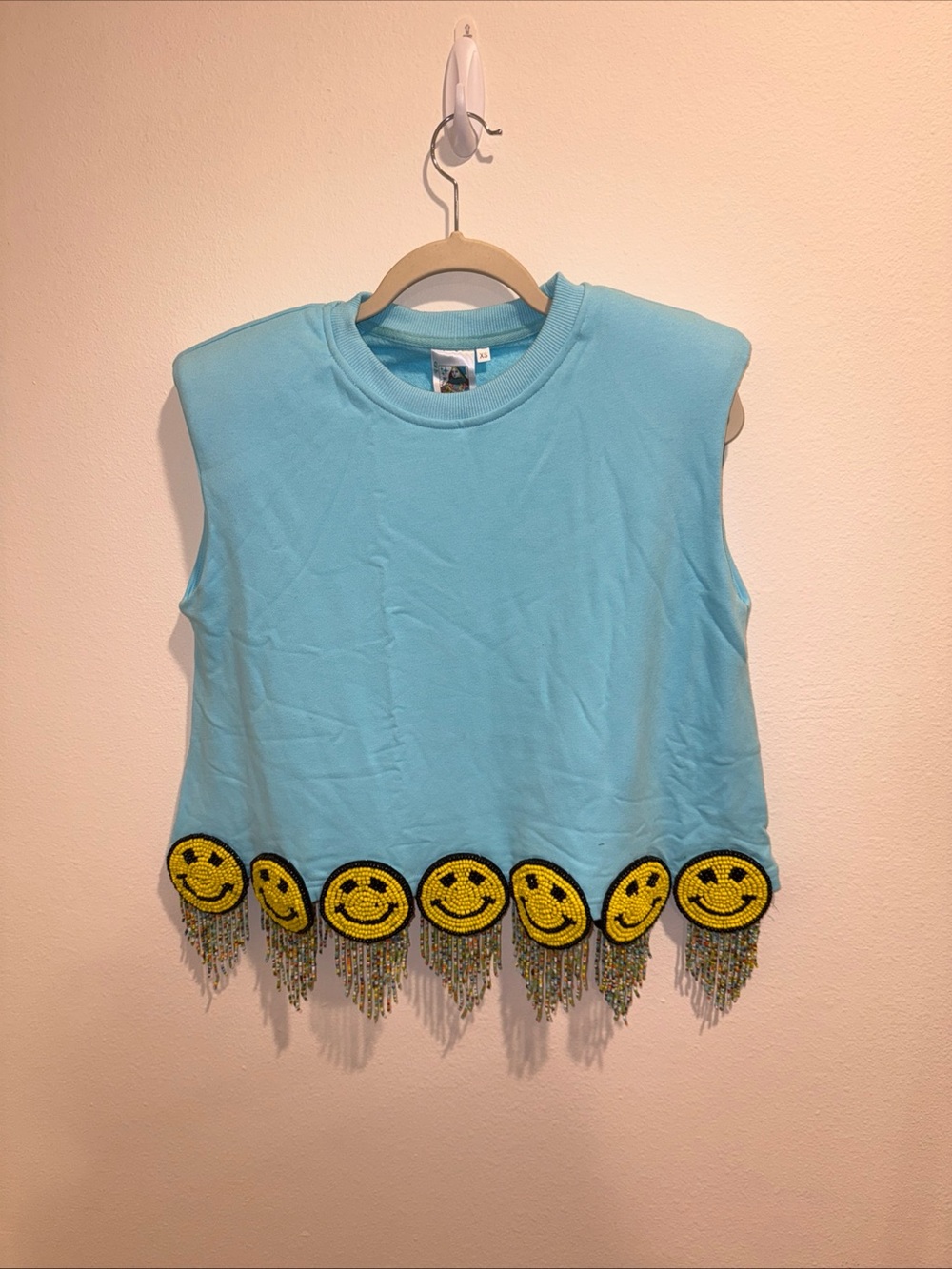 QUEEN OF SPARKLES Light Blue Sleeveless Muscle Tee with Yellow Smiley Fringe